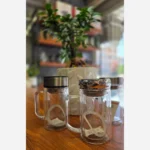 دمنوش‌ساز شیشه‌ای درب آینه‌ای دسته‌دار با فیلتر استیل - Image 4